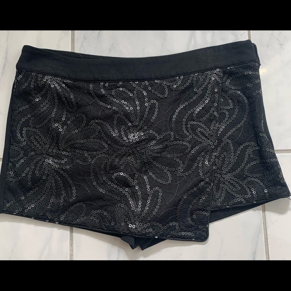 Forever 21 black skort. Sequin details in front.